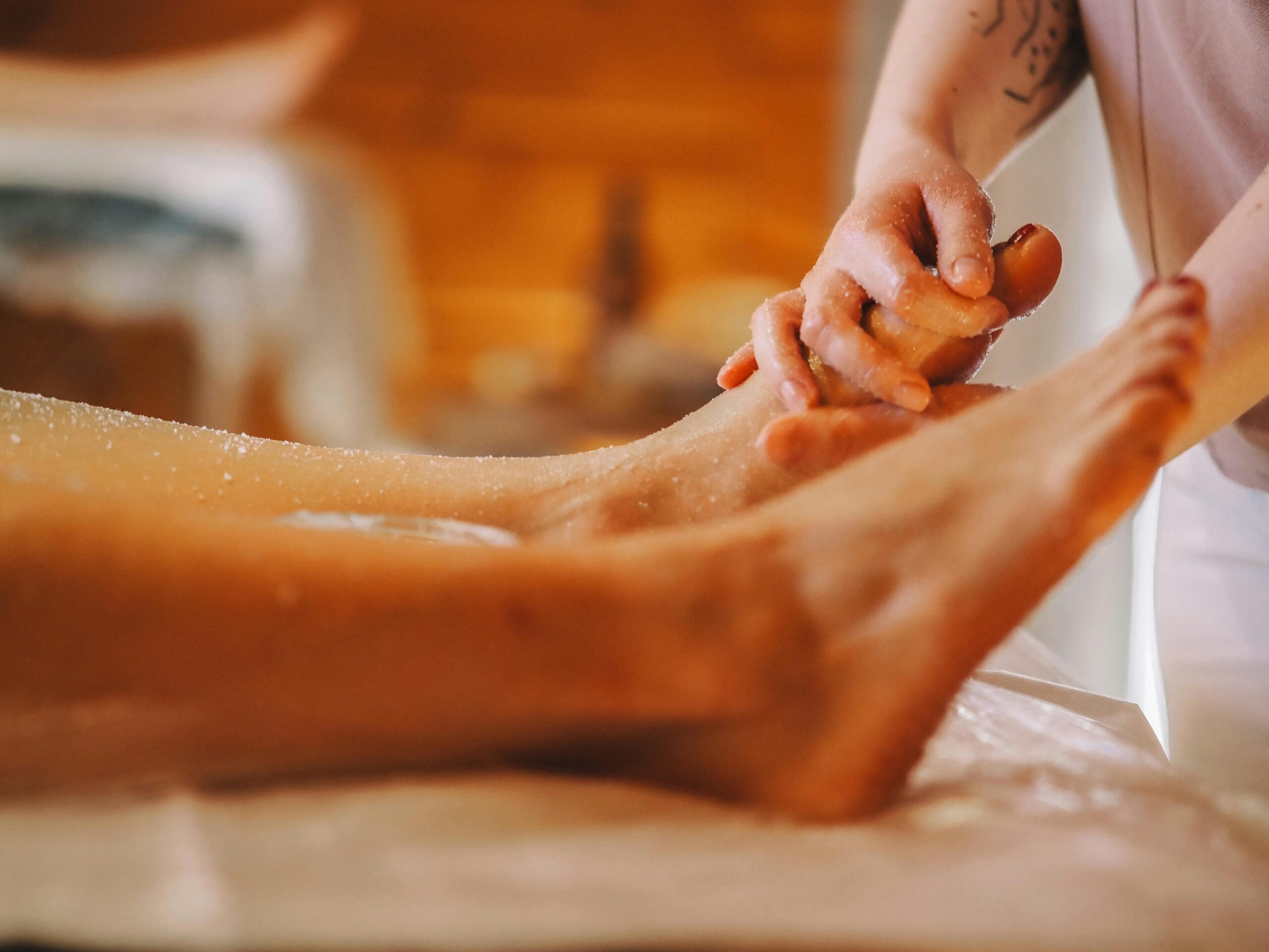 A soothing foot massage session in a tranquil spa, promoting relaxation and wellness.